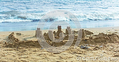 Sand castle on the beach Stock Photo