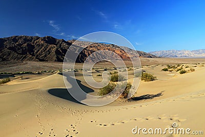 Desert Landscape of Mesquite Flat Sand Dunes and Panamint Mountains, Death Valley National Park California USA Stock Photo