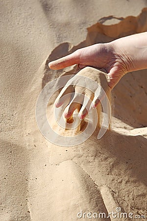 Sand in the hand Stock Photo