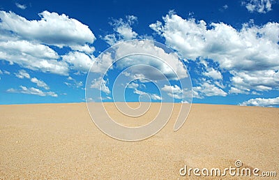 Sand meets Sky Stock Photo