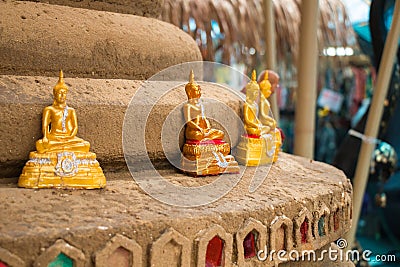 Sand pagoda with Buddha statues Stock Photo