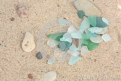 Sand with pieces of glass Stock Photo