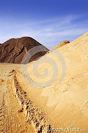 Sand quarry mounds of varied sands color Stock Photo