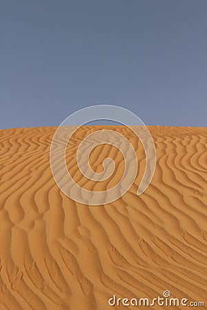 Sand Rippled by the Winds in Oman Stock Photo