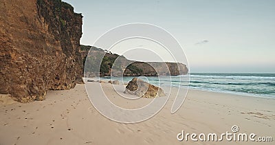Sand rock coast waves washed in slow motion aerial view. Nobody tropic landscape of cliff shore Stock Photo