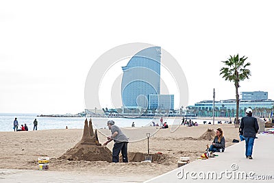 Sand sculptor working at La Barceloneta Beach in Barcelona Spain Editorial Stock Photo