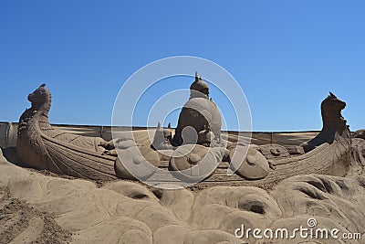 Sand sculpture depicting viking warriors in a viking ship Editorial Stock Photo
