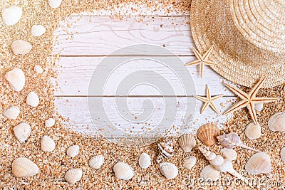 Sand seashells background. Summer time concept with sea shells and starfish on wooden background and sand Stock Photo