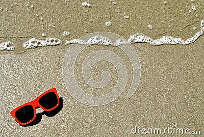 In the Sand - Sunglasses Stock Photo