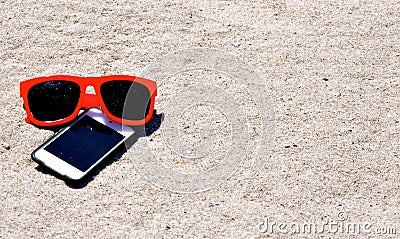 In the Sand-Sunglasses iPod iPhone Stock Photo