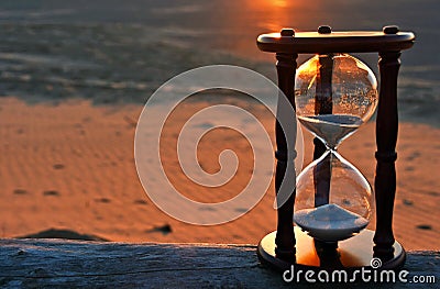 Sand timer with sunset glow Stock Photo