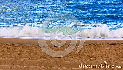 Sand and Waves Stock Photo