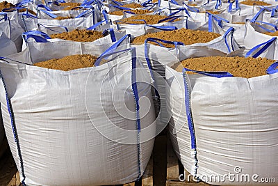 Sandbag white big bag sand sacks quarry Stock Photo