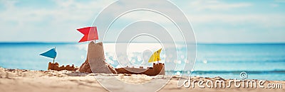 Sandcastle on the sea in summertime Stock Photo