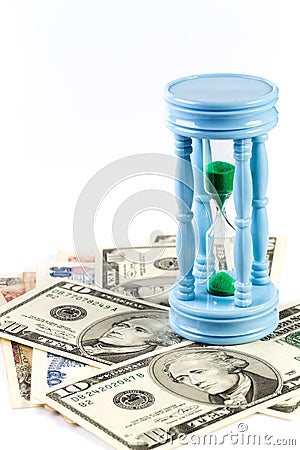 Sandclock on bank note represent money grow over time Stock Photo