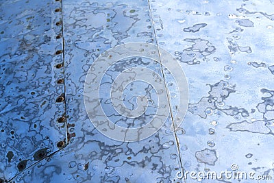 Sanded steel surface with rivets, blue color Stock Photo