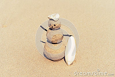Sandman, doll from sand, snowman by the beach Stock Photo