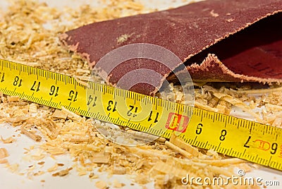 Sandpaper, ruler and sawdust Stock Photo