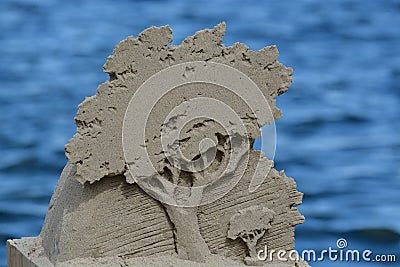 Sandsculpture Tree By The Lake Stock Photo