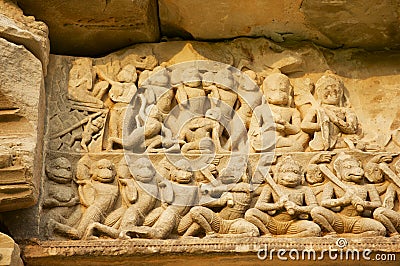 Sandstone carving with religious motifs at the ruins of the Hindu temple in Phimai historical park Prasat Hin Phimai in Thailand Stock Photo