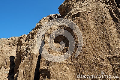 Sandstone is a fragmentary sedimentary rock, a homogeneous or layered aggregate of fragmentary grains and grains of sand Stock Photo