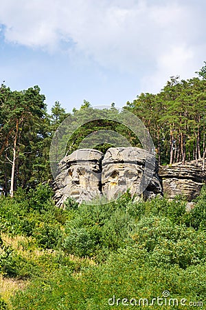 Sandstone rock sculptures Devils Heads near Zelizy, Czech Republic Stock Photo