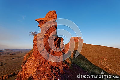 Sandstone rock stones during sunset on the top of a mountain in the Sunduki park Stock Photo