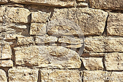 Sandstone wall with weather erosion Stock Photo