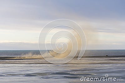 Sandstorm in Iceland winter over the sea Stock Photo