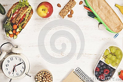 Sandwich, apple, grape, carrot, berry in plastic lunch boxes, st Stock Photo