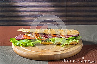 Sandwich with ham and fresh vegetables Stock Photo