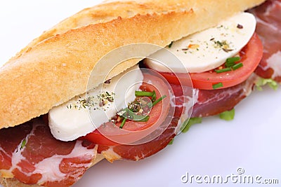 Sandwich with ham, mozzarella and tomato Stock Photo