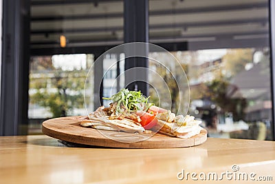 Sandwich with ham, tomato, cheese and golden French fries potato Stock Photo