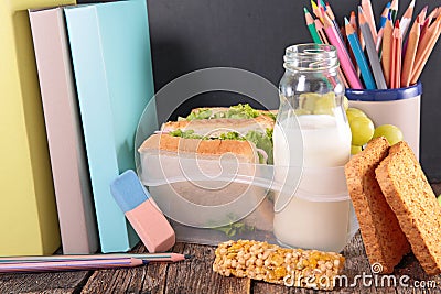 Sandwich,milk and book Stock Photo