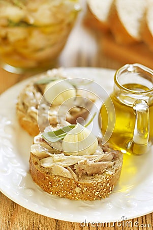 Sandwich with rabbit meat, garlic and sage Stock Photo