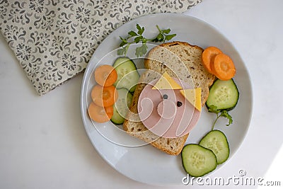 Sandwich with sausage, cucumber i n a plate Stock Photo