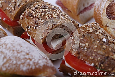 Sandwiches cutted into peaces with different breads and fillings Stock Photo
