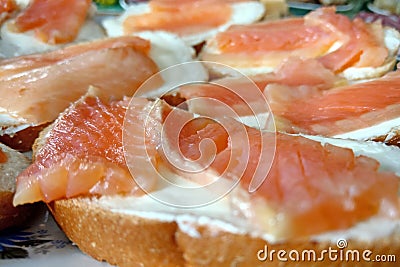 Sandwiches with juicy tasty trout close-up Stock Photo