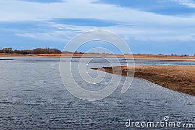 Sandy banks of the autumn river Stock Photo