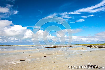 Sandy Bay and Cloudscape. Cata Sand, Sanday, Orkney, Scotland Stock Photo
