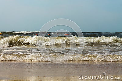Sandy beach Baltic Sea. Beach sunset. Waves on the sandy beach. Stock Photo