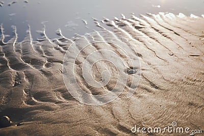 Sandy beach puddle Stock Photo