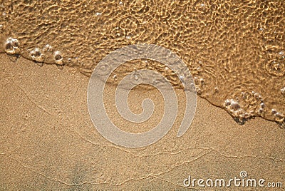 Sandy Beach with Wave Stock Photo