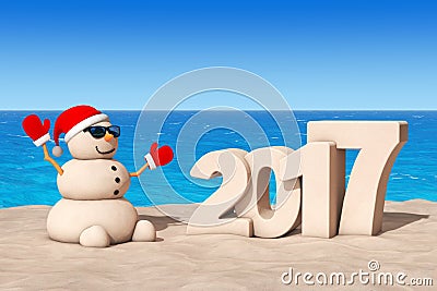 Sandy Christmas Snowman at Sunny Beach with 2017 Ney Year Sign. Stock Photo