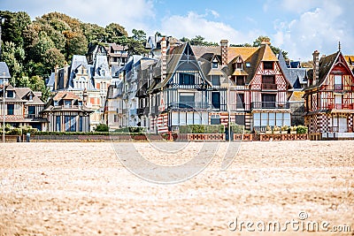 Sandy coastline with buildings in Trouville, France Stock Photo