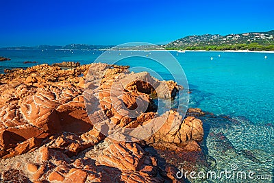 Sandy Palombaggia beach with red rocks, pine trees and azure clear water, Corsica, France, Europe. Stock Photo