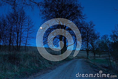 Sandy rural road at night Stock Photo