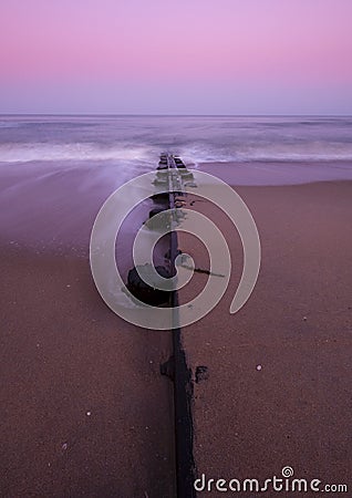 Sandy shore at dawn Stock Photo