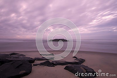 Sandy shore at dawn Stock Photo