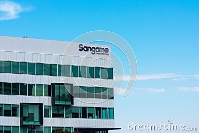 Sangamo sign and logo atop American biopharmaceutical company Sangamo Therapeutics Editorial Stock Photo